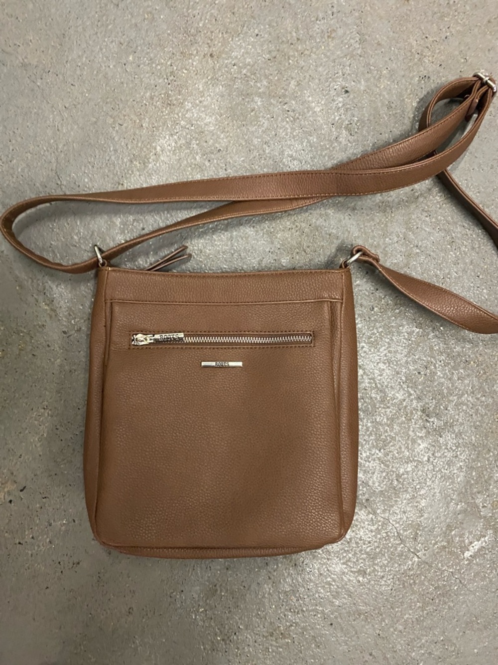Roots Tan Pebbled Leather Crossbody with Silver Accents